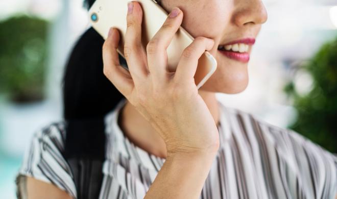 Woman making a phone call.